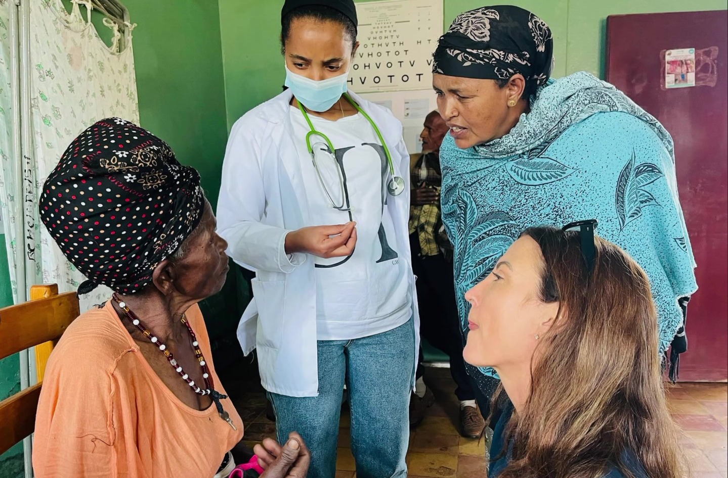 A clinician examining a patient at an Engera-supported health center