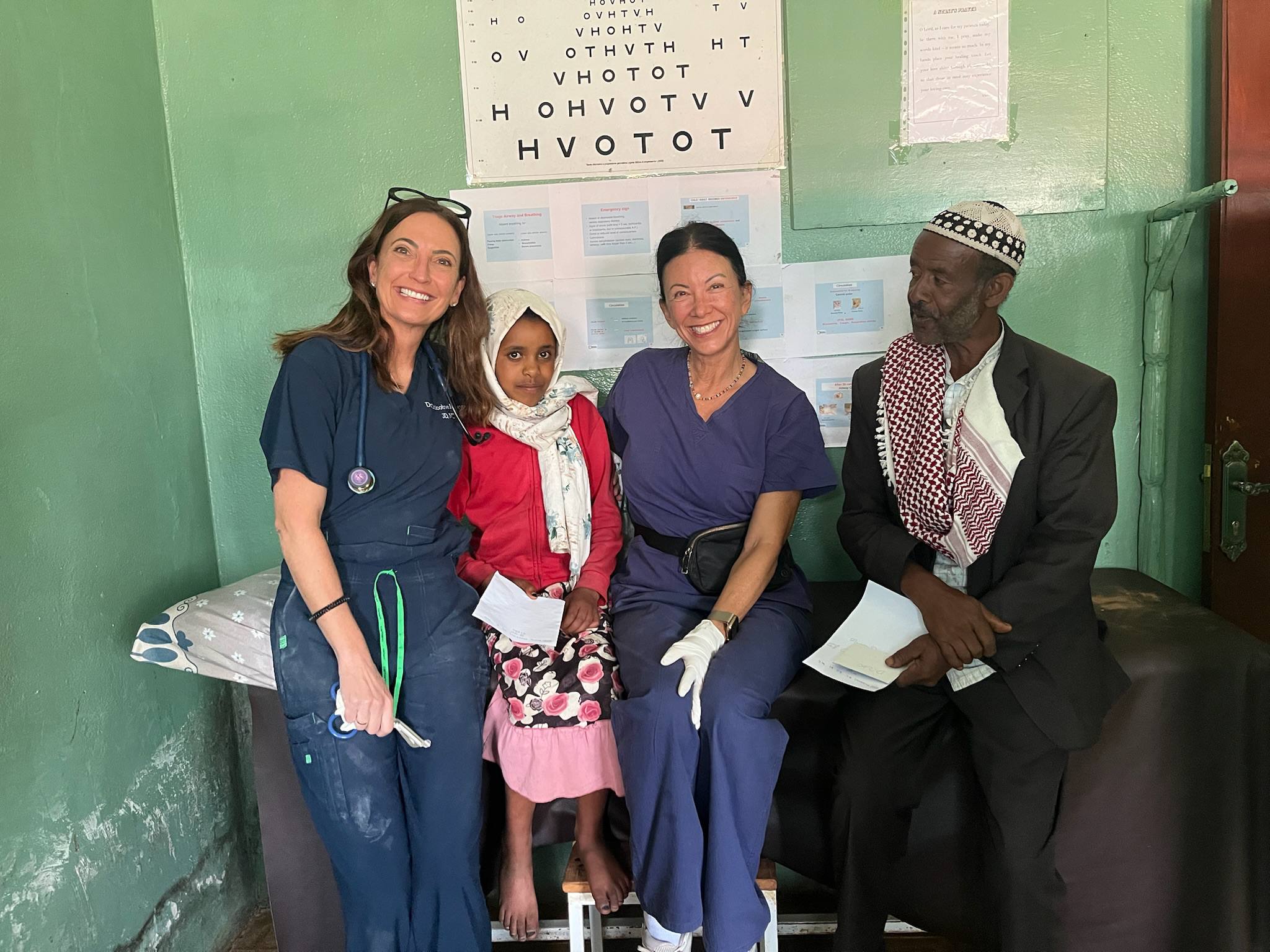Engera medical volunteers with patients at Gura Megenasse Health Centre