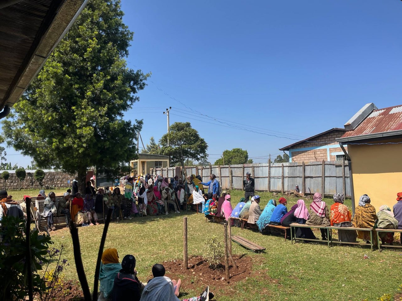 Community members gathered outside Zizencho Health Centre